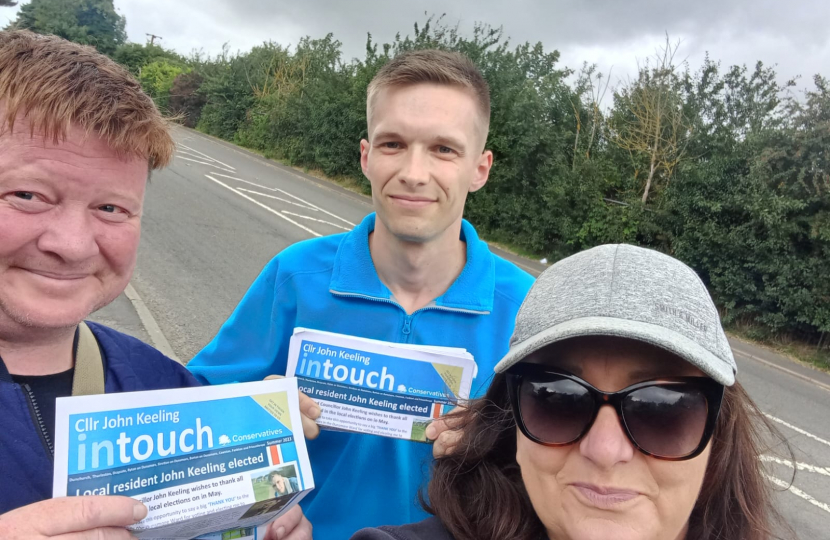 Dale, John and Lisa out delivering